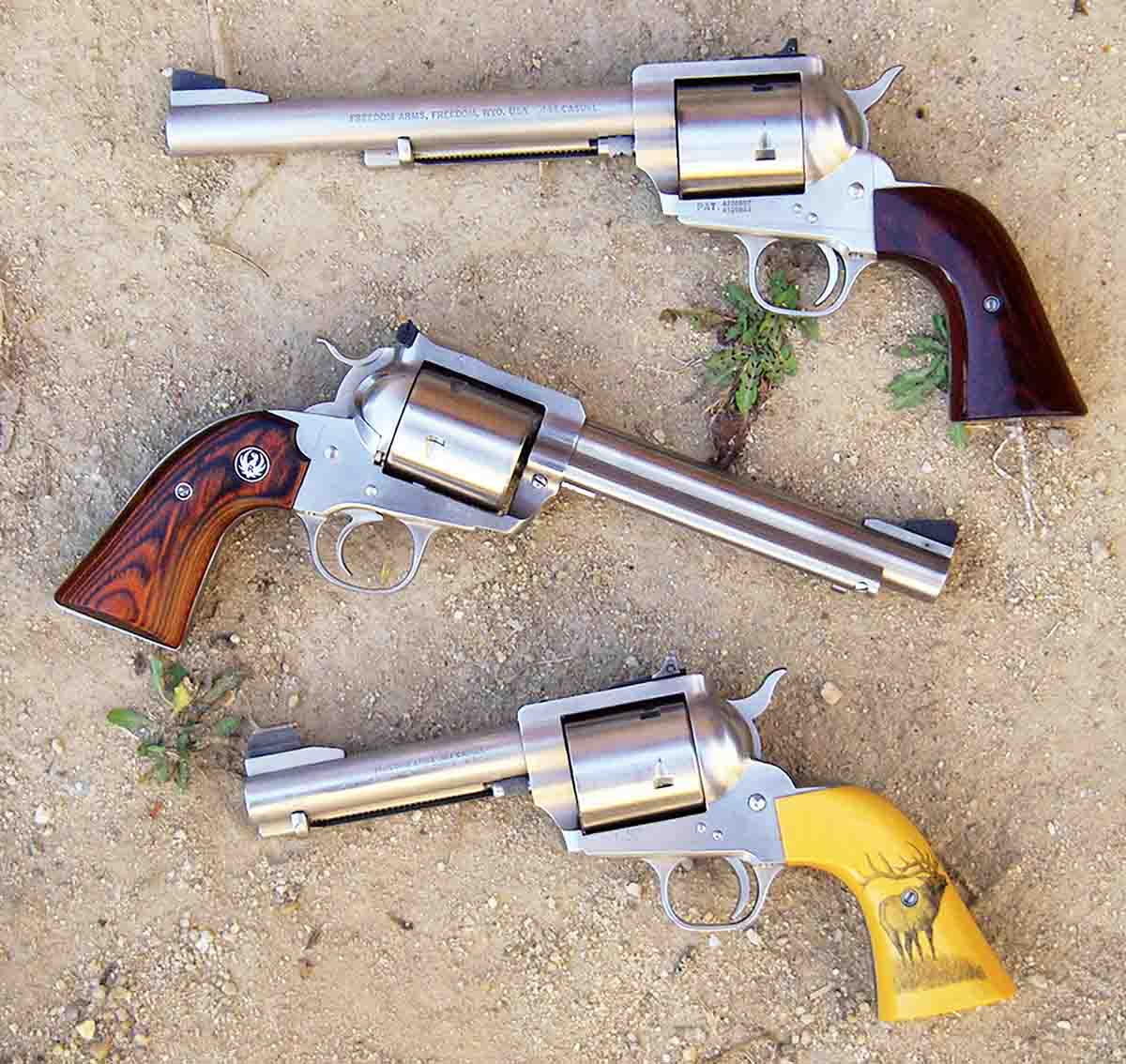 Typical revolvers chambered for the .454 Casull include (top to bottom) a Freedom Arms Model 83 with a 7½-inch barrel, a Ruger New Model Super Blackhawk Bisley with a 6½-inch barrel and a custom Freedom Arms Model 83 with a 4¾-inch barrel.